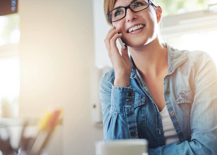 A joyful woman in Rancho Cucamonga, California hears a fair bathroom remodeling estimate
